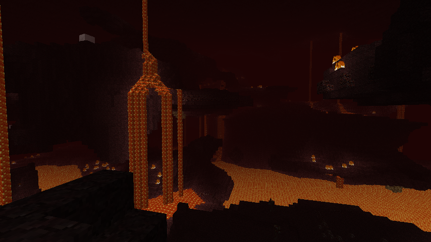 A screenshot of a lava waterfall in the nether in Minecraft.