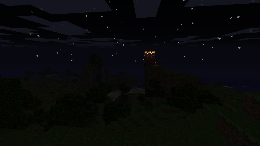  screenshot of a burning fortress made of netherrock on the top of a cliff during the night in Minecraft.