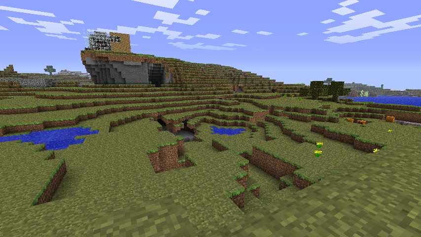 A screenshot of a house made of wood and glass on the top of a hill in Minecraft.