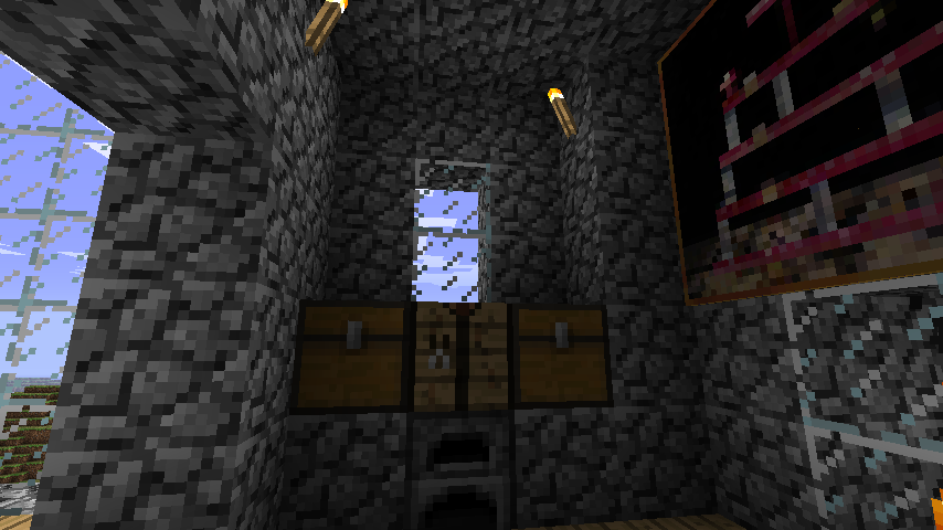 A screenshot of a workbench flanked by two chests in Minecraft.