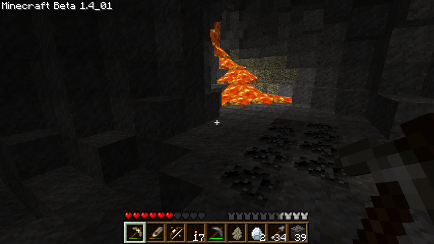 A screenshot of a lava in a mine shaft in a cave in Minecraft.