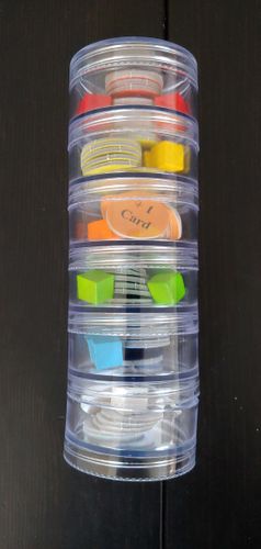 Dominion Adventures tokens stored in a 2" diamater Paylak storage container tower.